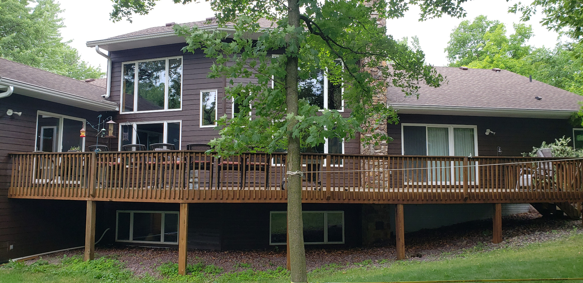 Home with cedar shake style roof